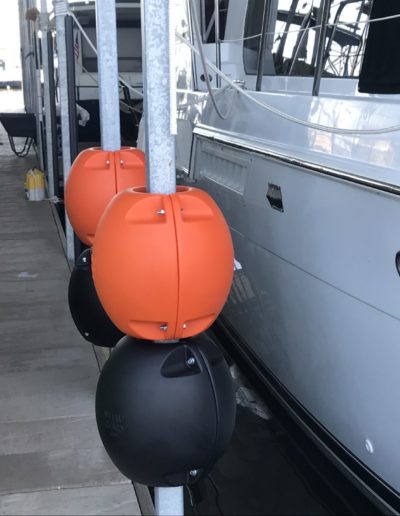 Boat with WhamGuard Rotating Boat Dock Bumpers